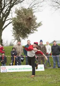 Martin Piotrowski taking part in the Christmas Tree Throwing Championships at Tim Smyth Park, Ennis on Sunday. Photograph by Eamon Ward