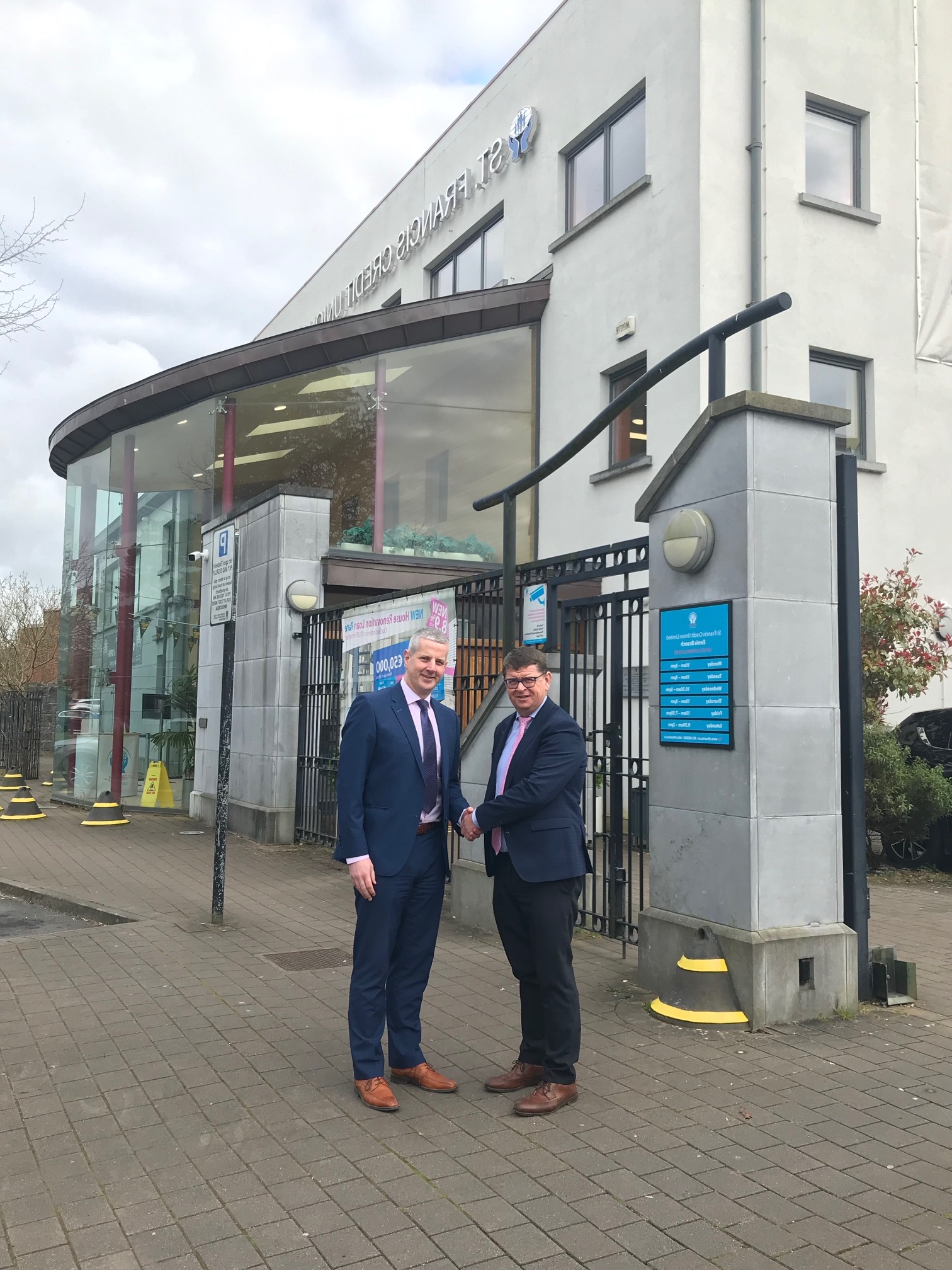 CEO Louis Fay welcoming Damien Browne to the St Francis Credit Union team in Ennis