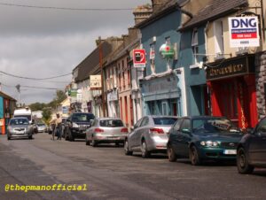 corofin 26-07-19 6 main street traffic cycling camper van