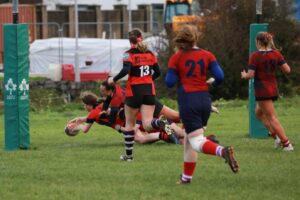 Photo of Ennis’ Patritia Coote scoring taken by Helen McQuillan