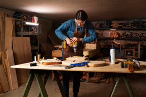 full-shot-artisan-doing-woodcutting