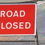 British road closed sign on a street in Scotland