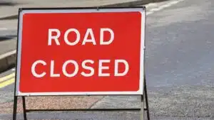 British road closed sign on a street in Scotland