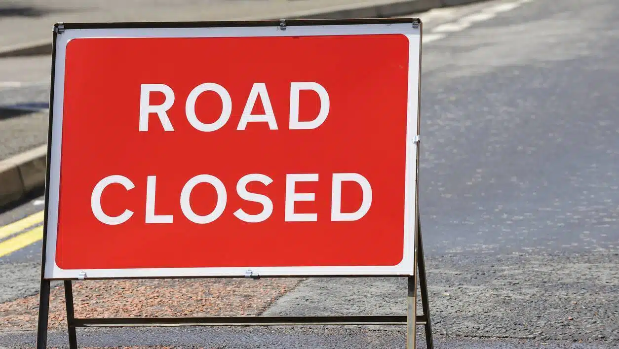 British road closed sign on a street in Scotland