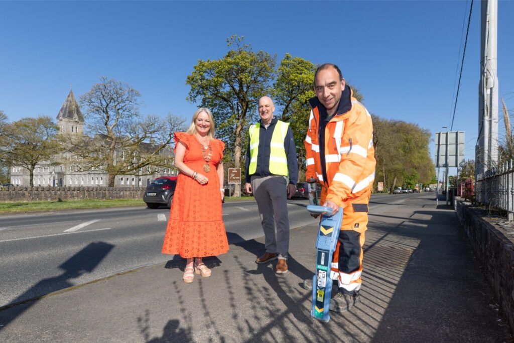 Sean Abeyta from GLAS Civil Engineering with Cllr Mary Howard and Senior Engineer Ennis Municipal District Hugh McGrath at the site of one of the new bus stops. Photograph: Eamon Ward