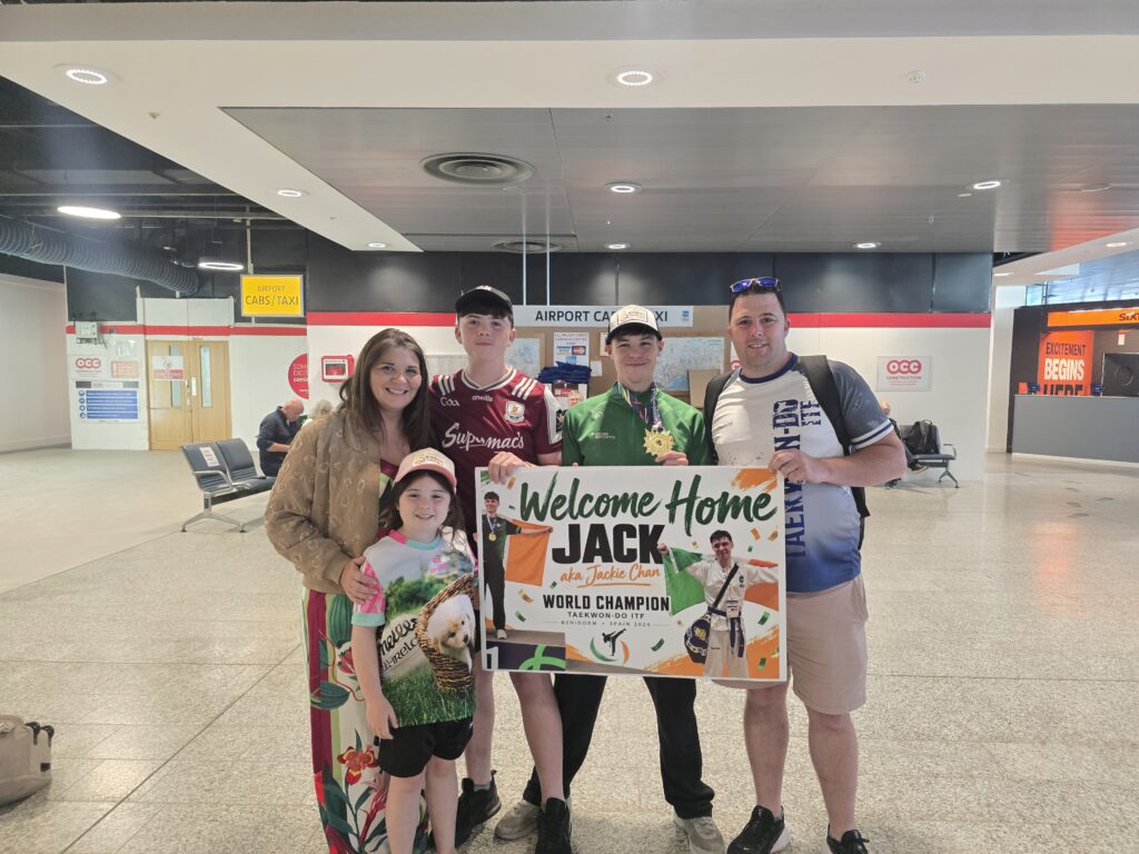Photo: Jack welcomed home by family at the airport